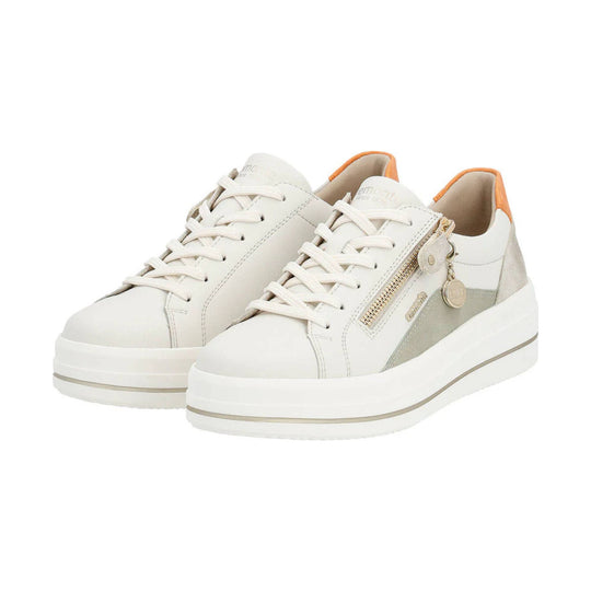 Off-white low-top sneakers with side zippers, white laces, and orange heel accents