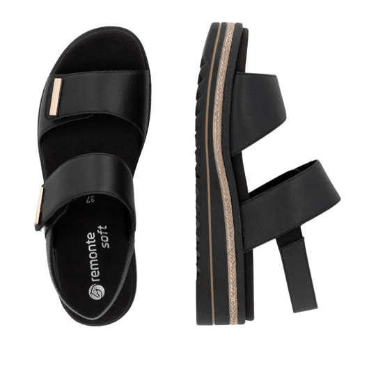 Black two-strap wedge sandal with a tan rope-trim sole and gold accent bars