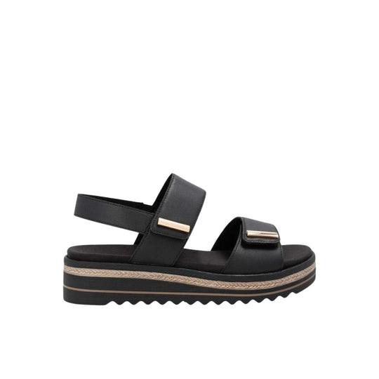 Black platform sandal with two wide straps and gold bar hardware