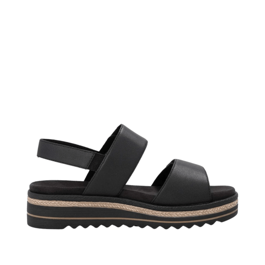 Black platform sandal with two wide straps and a textured tan midsole