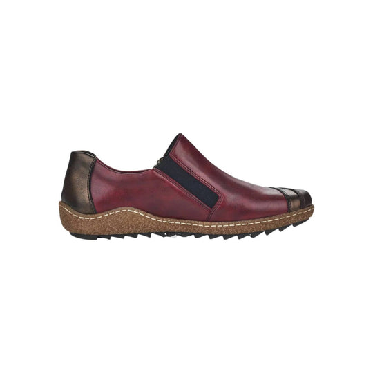 Burgundy slip-on shoe with black elastic side panel, black toe and heel accents, and a cork-textured sole