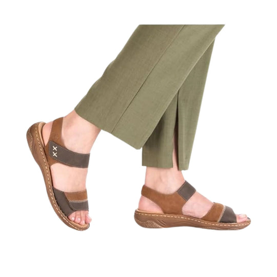 Brown and taupe open-toe wedge sandal with ankle strap and side cutouts