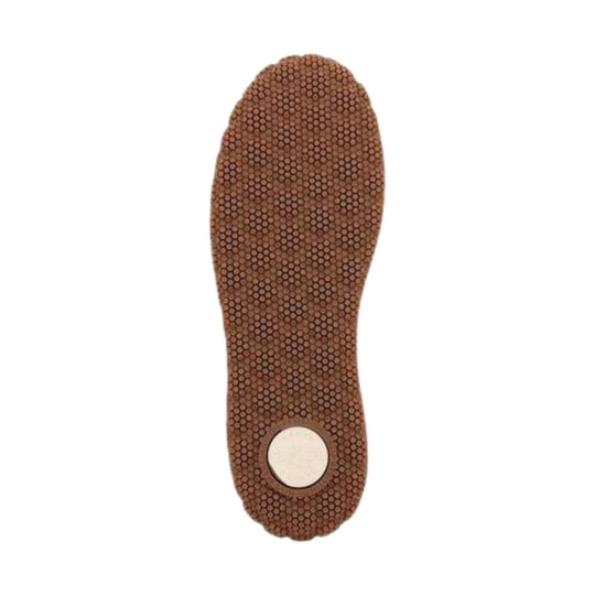 Brown shoe outsole with a textured dot pattern and a circular white heel insert