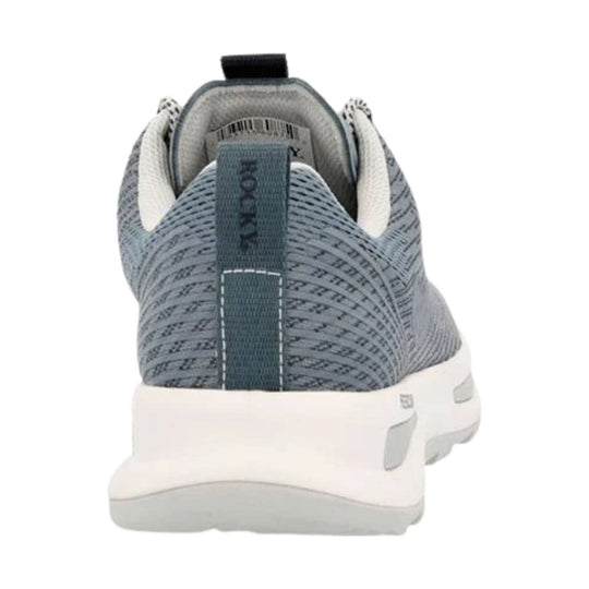 Gray knit athletic shoe seen from the heel with a white sole and vertical heel pull tab.