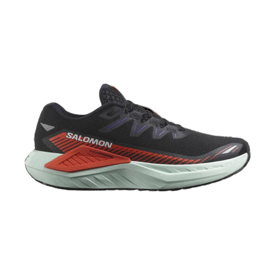Black low-profile running shoe with red side detail and light gray midsole, side view