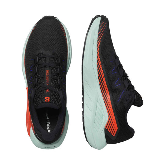 Black running shoes with mint-green midsoles and orange accents, shown from top and side views