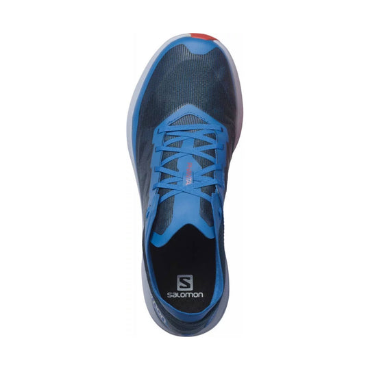 Blue and dark running shoe with mesh upper, laces, and Salomon branding on the insole and tongue