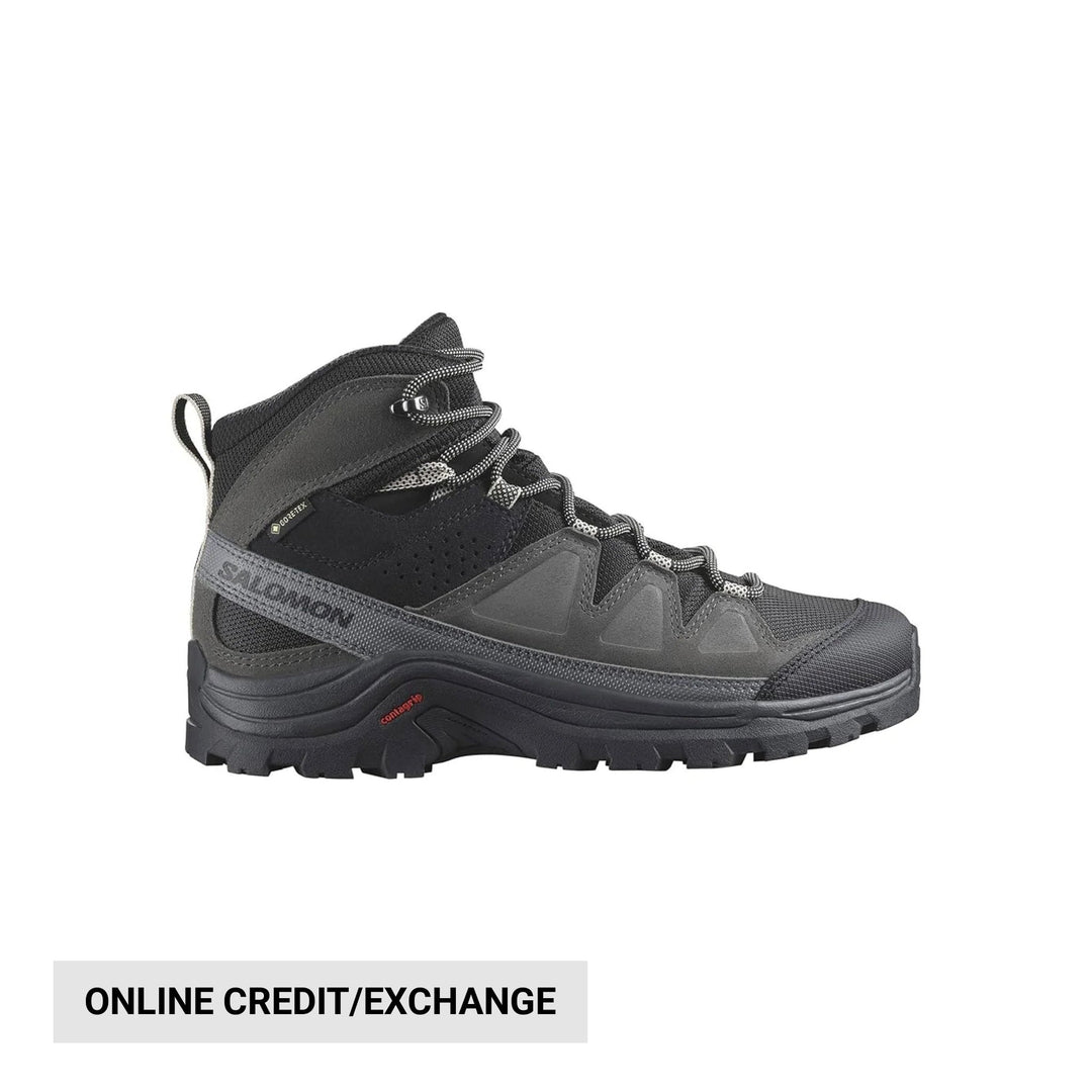 Gray and black mid-height hiking boot with bungee laces and rugged tread