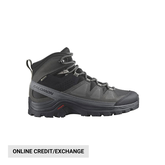 Gray and black mid-height hiking boot with bungee laces and rugged tread