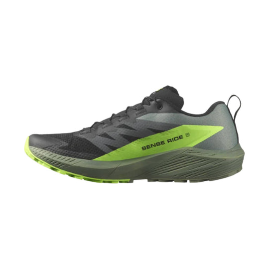 Black and gray trail running shoe with neon green side panel and outsole, shown in side view