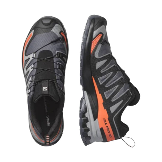 Black and gray trail running shoes with orange accents, shown top and side views