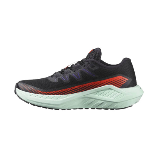 Black running shoe with mint green sole and red side stripe, shown in profile