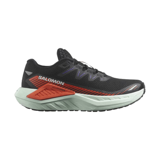 Black road running shoe with a thick white midsole, orange side accents, and purple lace details