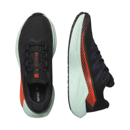 Black running shoe with mint green sole, orange side accents, and visible DRX and Ortholite branding