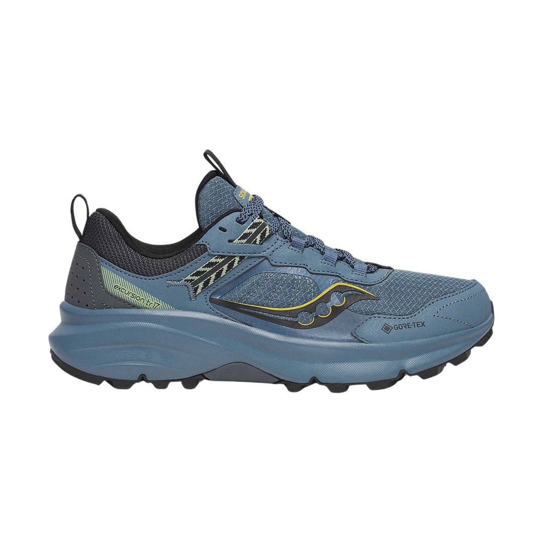 Blue low-top trail shoe with bungee laces, black heel collar, and lugged sole