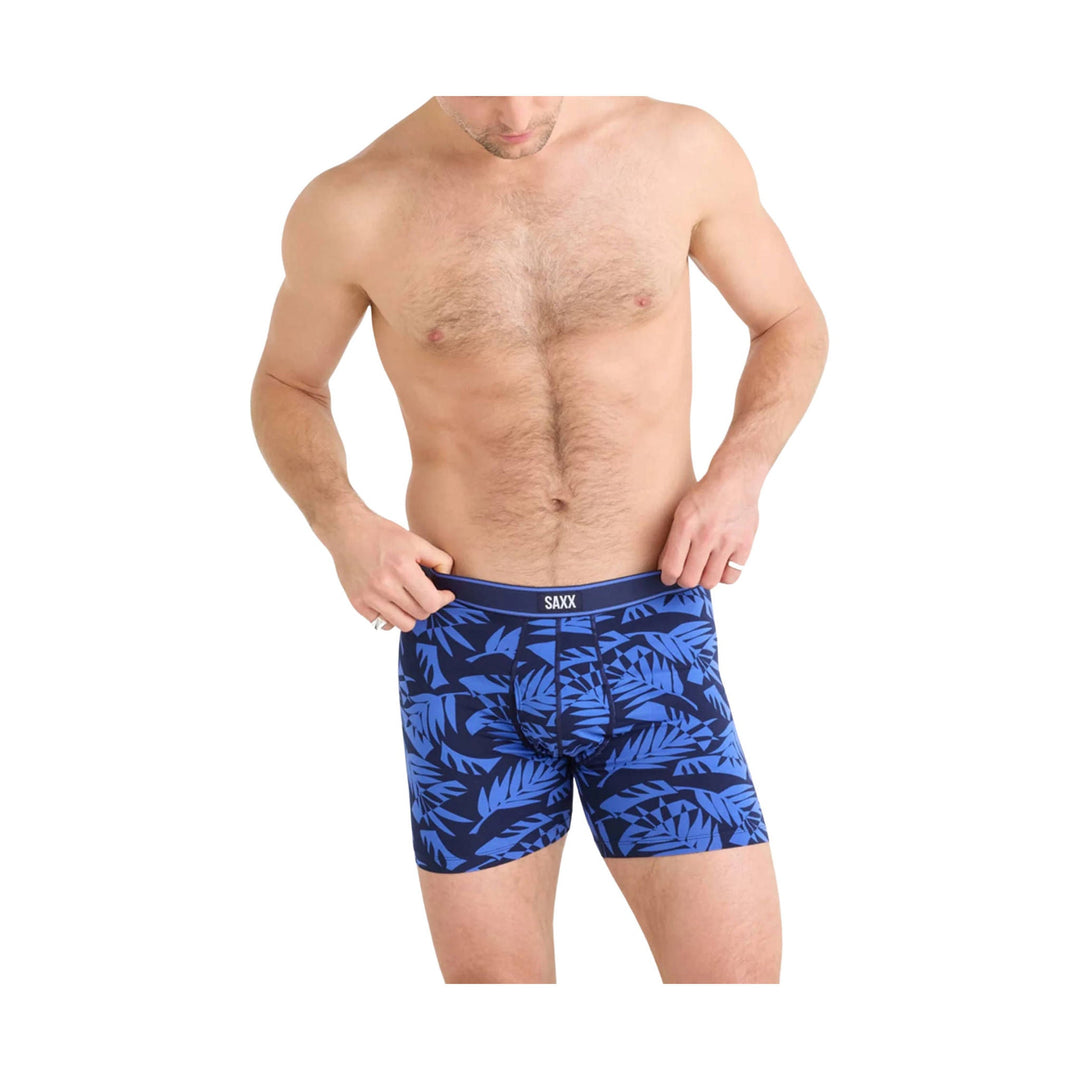 Blue and black patterned boxer briefs with visible SAXX waistband logo