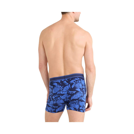 Back view of blue and navy leaf-print boxer briefs on a white background