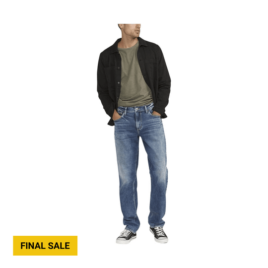 Blue straight-leg jeans styled with a black overshirt, olive T-shirt, and black sneakers; FINAL SALE text