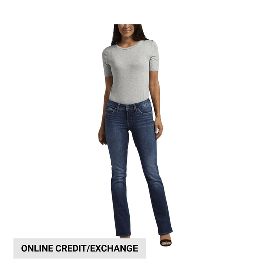 Dark blue slim bootcut jeans on a model with a gray short-sleeve top