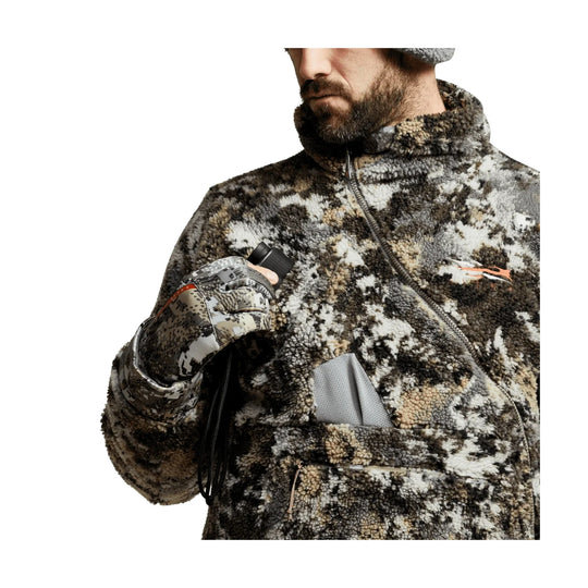 Camouflage sherpa fleece jacket with zip neck, chest pocket, and matching gloves