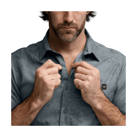 Gray short-sleeve button-up shirt with a chest pocket and subtle textured pattern