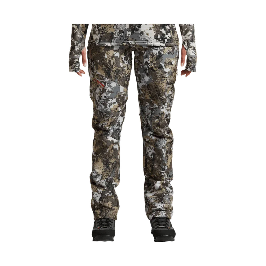 Camo hunting pants shown on a model, front view