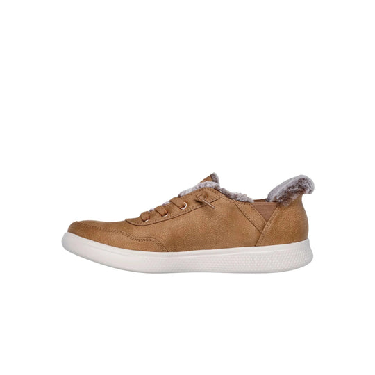 Tan low-top sneaker with faux fur lining, white sole, and lace-up front