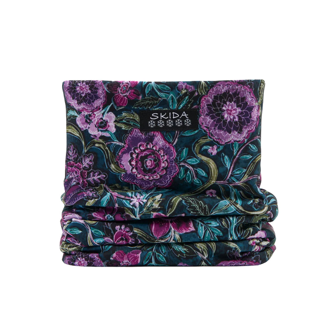 Floral patterned fleece neck warmer with a Skida label