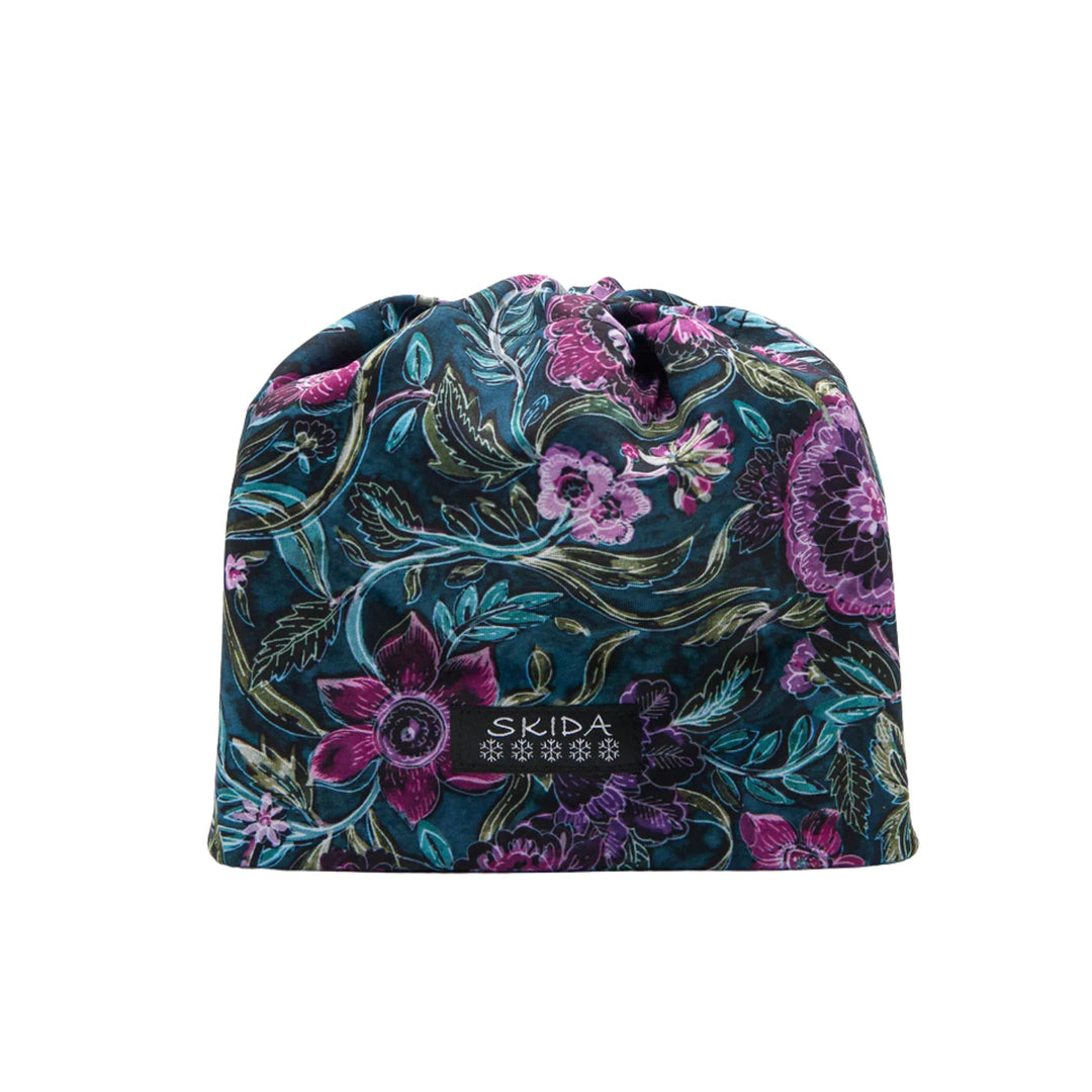 Floral patterned knit beanie with a black SKIDA patch label