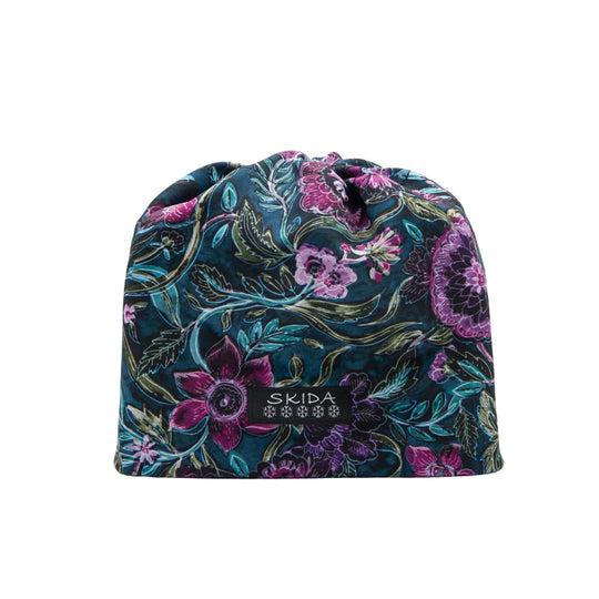 Floral patterned knit beanie with a black SKIDA patch label