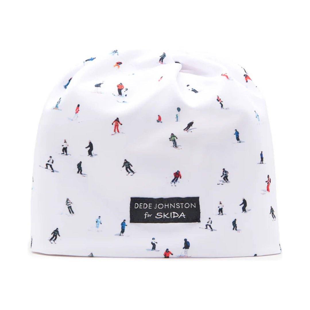 White beanie with tiny skier print and visible Skida label