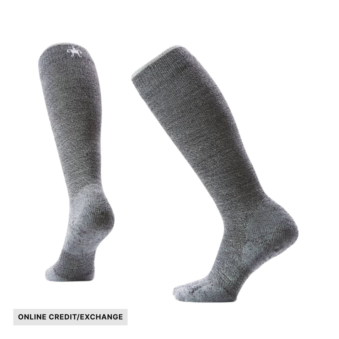 Pair of gray knee-high socks with a small logo and an ONLINE CREDIT/EXCHANGE label