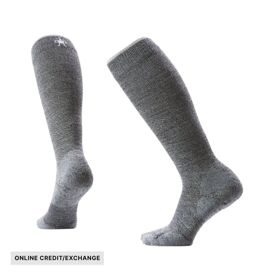 Pair of gray knee-high socks with a small logo and an ONLINE CREDIT/EXCHANGE label