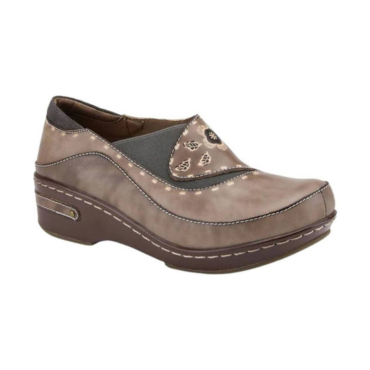 Taupe and brown wedge clog with stitched detailing, floral pattern accents, and a closed toe