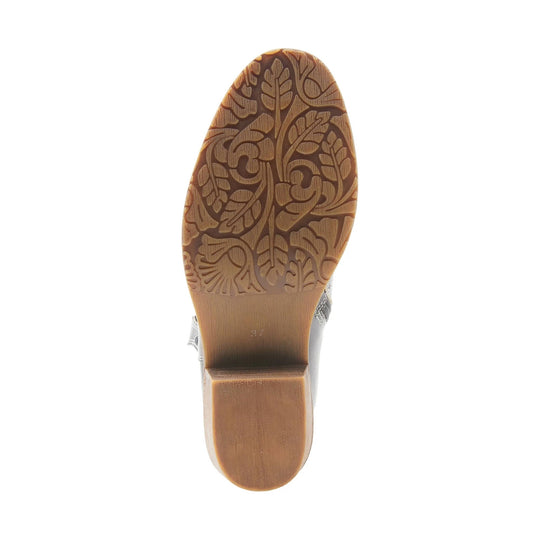 Tan patterned boot sole with block heel, viewed from below