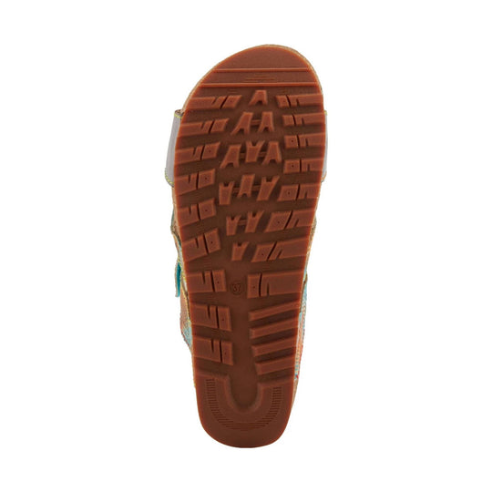 Brown outsole of a sandal with deep tread and size 37 marking