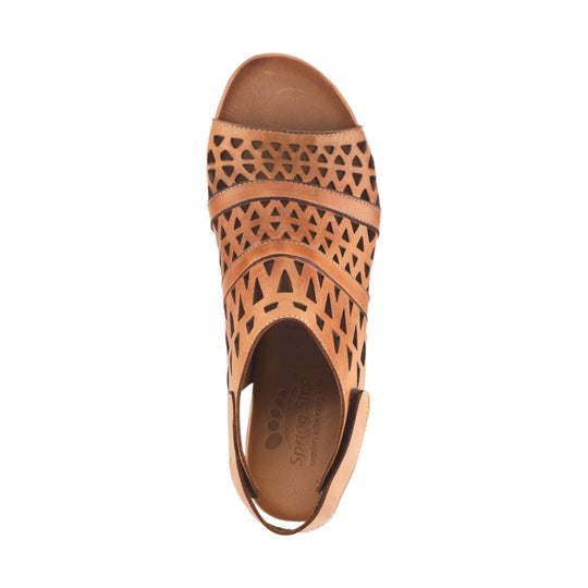 Tan and brown closed-toe sandal with cutout upper and elastic heel strap, top view