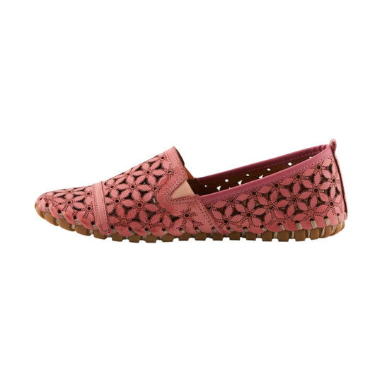Pink perforated slip-on flat with floral cutout pattern and brown sole