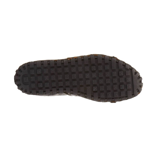 Dark brown rubber lug outsole with square tread blocks and rounded toe shape