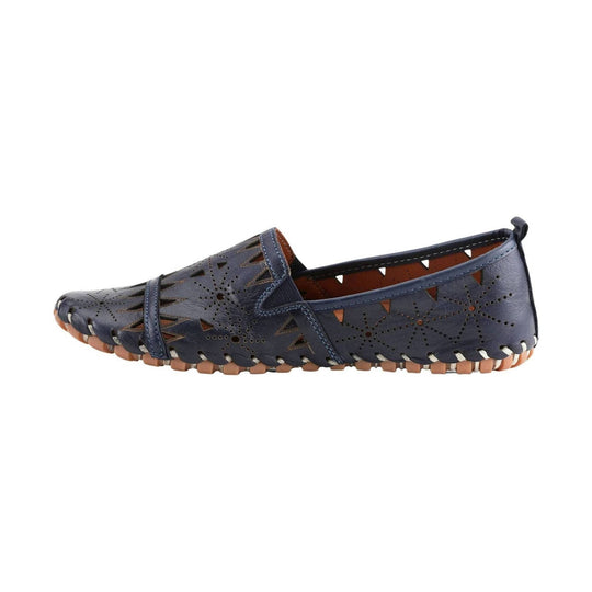 Navy leather slip-on loafer with laser-cut floral cutouts and tan sole