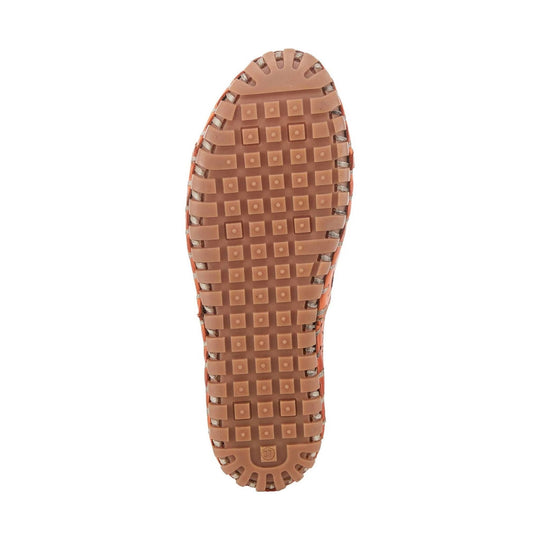 Tan rubber shoe outsole with square tread pattern and toe-to-heel profile
