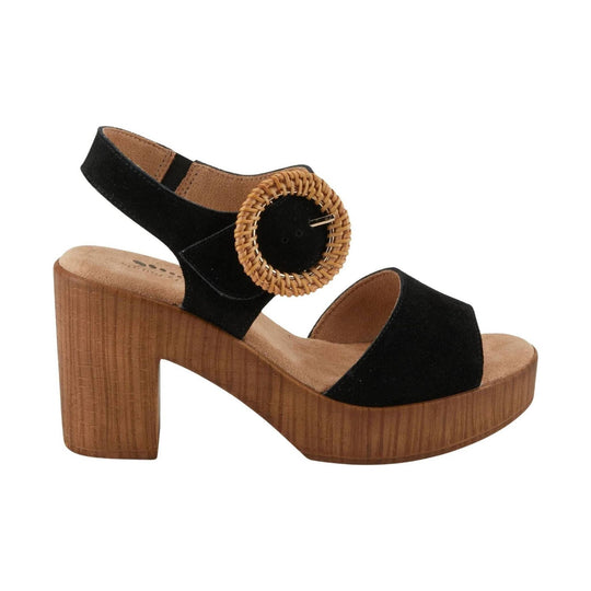 Black suede platform sandal with a wood-look block heel and large woven buckle detail