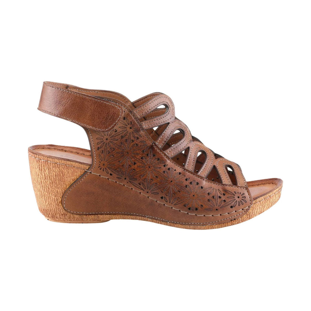 Brown wedge sandal with floral cutout details, slingback strap, and open toe