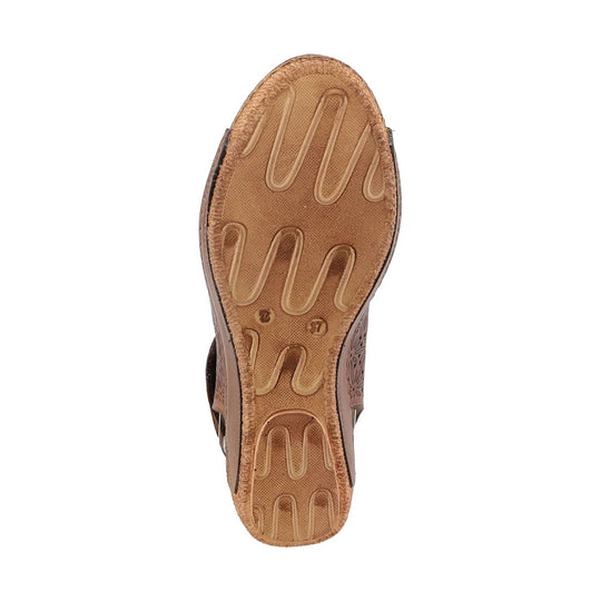 Brown sandal outsole with wavy tread and size markings, viewed from below