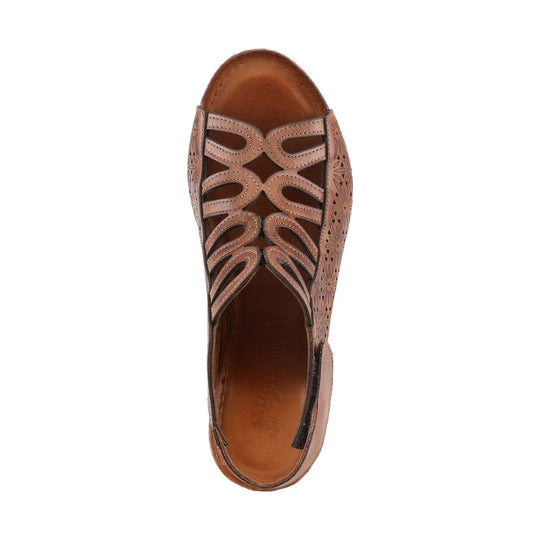 Brown closed-toe leather sandal with cutout strap detailing and floral side cutouts, top view