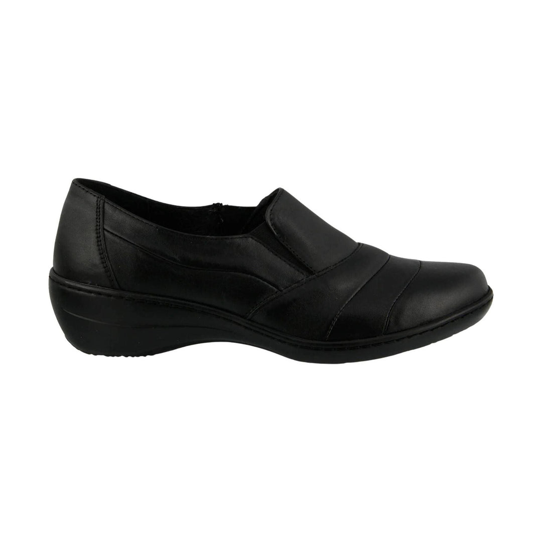 Black slip-on wedge shoe with a rounded toe and stitched upper