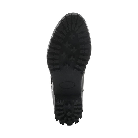Black boot sole with deep tread pattern, viewed from below
