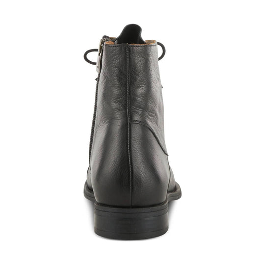 Black leather ankle boot viewed from the back with a low stacked heel and side zipper