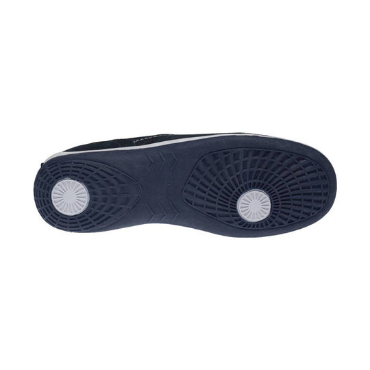Navy sneaker outsole with two circular tread pods and white pivot inserts