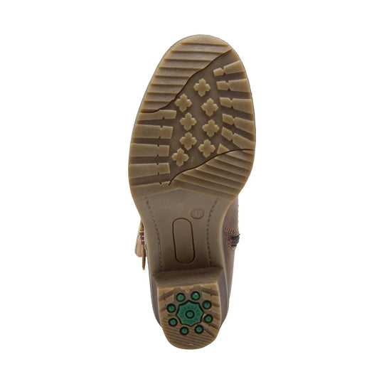 Brown lugged boot outsole with cushioned heel insert